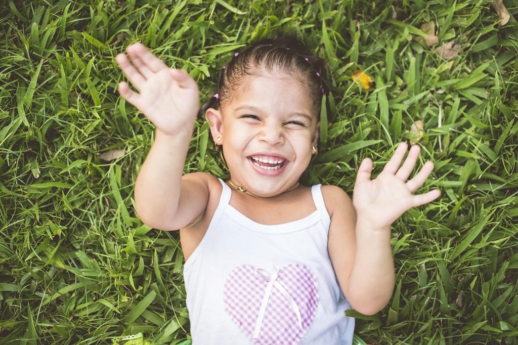 kid on the grass